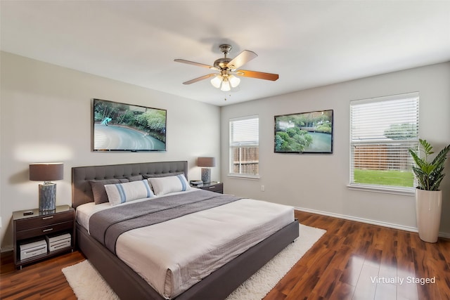 4006 Autumnwood Ln, Heartland, TX 75126 - bedroom featuring baseboards, wood finished floors, and ceiling fan