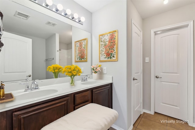 4006 Autumnwood Ln, Heartland, TX 75126 - full bathroom with tile patterned flooring, double vanity, and a shower