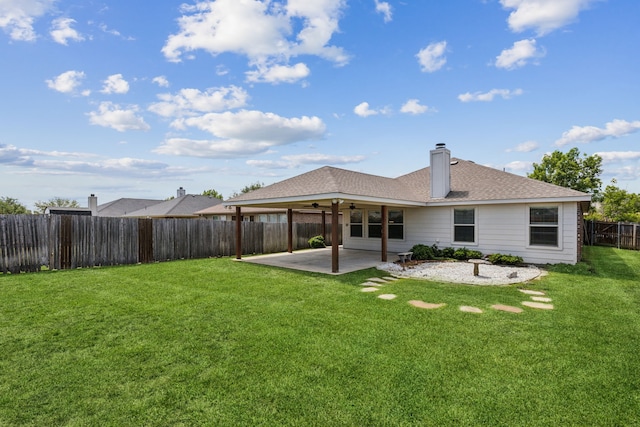 4006 Autumnwood Ln, Heartland, TX 75126 - rear view of house with ceiling fan, a patio, a chimney, and a shingled roof