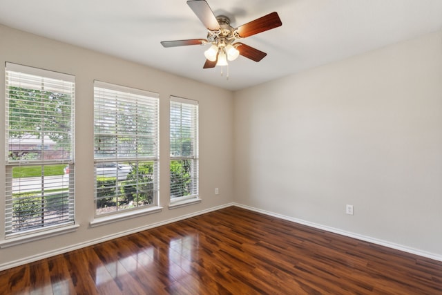 4006 Autumnwood Ln, Heartland, TX 75126 - spare room with baseboards, dark wood-style floors, and a ceiling fan
