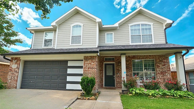 6920 Willow Crest Dr, Mckinney, TX 75070 - view of front of house featuring driveway, an attached garage, a porch, and brick siding