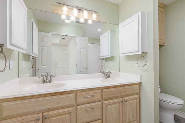 709 Billups Cir, Van Alstyne, TX 75495 - bathroom with double vanity and toilet