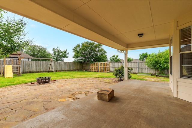 709 Billups Cir, Van Alstyne, TX 75495 - view of patio / terrace featuring a fire pit