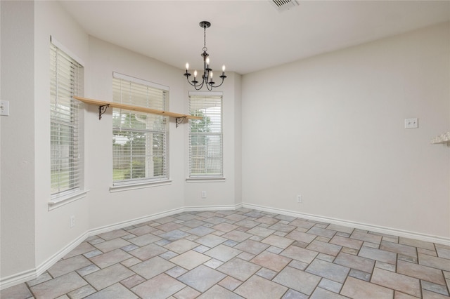 709 Billups Cir, Van Alstyne, TX 75495 - spare room featuring a chandelier and baseboards