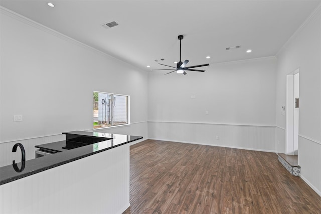 2109 Greta Ln, Fort Worth, TX 76120 - kitchen with wood finished floors, ceiling fan, crown molding, recessed lighting, and a wainscoted wall