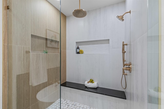 2109 Greta Ln, Fort Worth, TX 76120 - bathroom featuring a tile shower