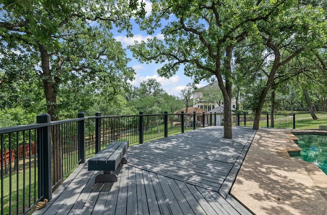 2109 Greta Ln, Fort Worth, TX 76120 - deck featuring view of wooded area