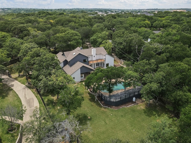 2109 Greta Ln, Fort Worth, TX 76120 - view from above of property featuring a pool and a heavily wooded area