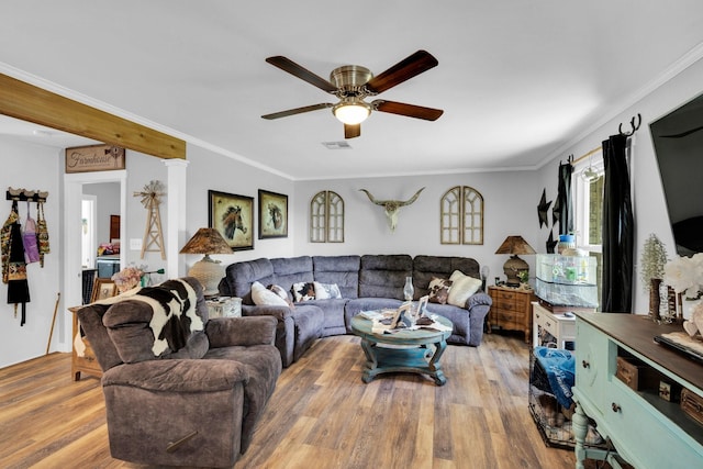 6199 State Highway 22, Hillsboro, TX 76645 - living room with ceiling fan, light wood finished floors, and ornamental molding