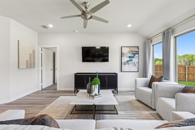 751 Water View Dr, Lavon, TX 75166 - living room with light wood-style floors, baseboards, ceiling fan, recessed lighting, and vaulted ceiling