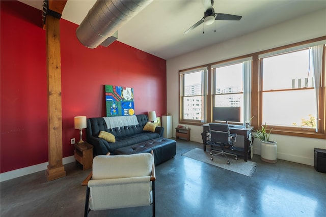 2502 Live Oak St Unit 314, Dallas, TX 75204 - living room with plenty of natural light, finished concrete floors, ceiling fan, and baseboards