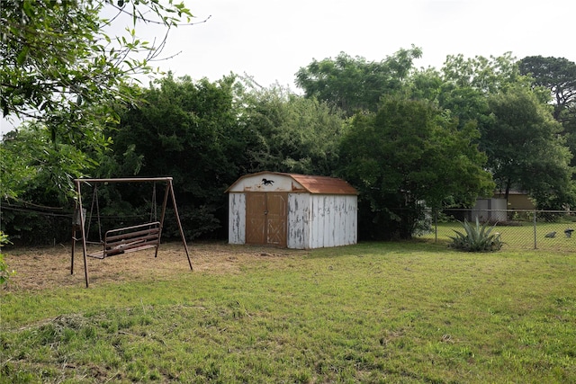 1219 Daisy Ln, Irving, TX 75061 - view of yard featuring a storage unit and an outbuilding