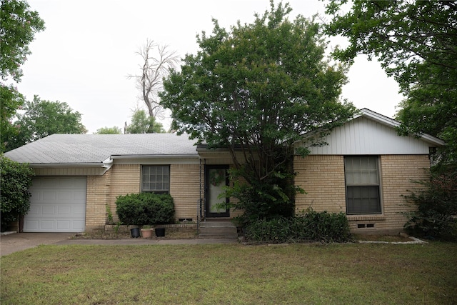 1219 Daisy Ln, Irving, TX 75061 - ranch-style house featuring brick siding, an attached garage, driveway, and a front yard