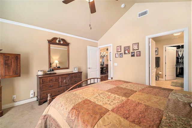 bedroom featuring high vaulted ceiling, connected bathroom, baseboards, a ceiling fan, and light colored carpet