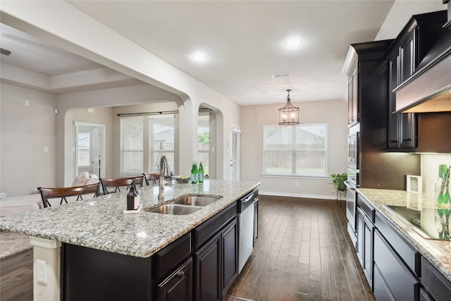 307 Acadia Ln, Forney, TX 75126 - kitchen with a sink, dark wood-style flooring, custom range hood, baseboards, and recessed lighting