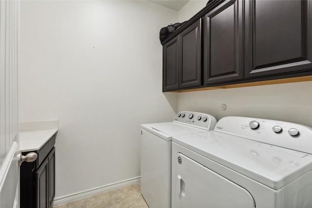 307 Acadia Ln, Forney, TX 75126 - laundry room featuring cabinet space, washer and dryer, and baseboards