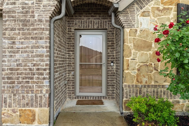 307 Acadia Ln, Forney, TX 75126 - view of exterior entry featuring brick siding and stone siding