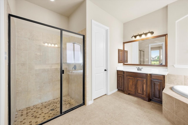211 Crestbrook Dr, Rockwall, TX 75087 - bathroom featuring a stall shower, a garden tub, vanity, and tile patterned floors