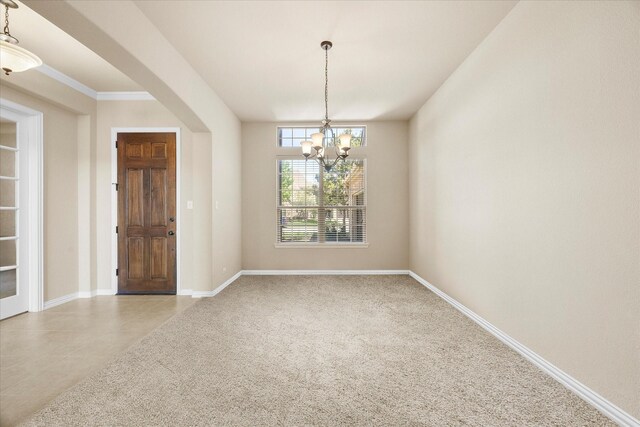 211 Crestbrook Dr, Rockwall, TX 75087 - spare room featuring a chandelier and baseboards