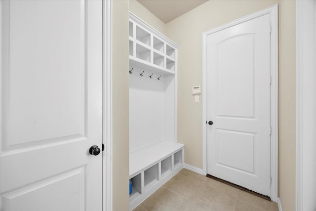 211 Crestbrook Dr, Rockwall, TX 75087 - mudroom featuring light tile patterned floors and baseboards