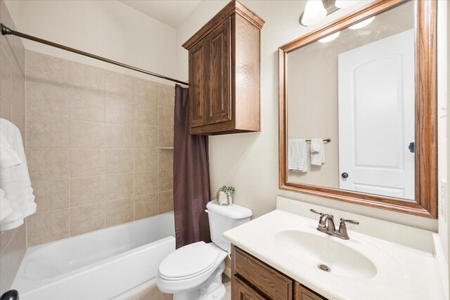 211 Crestbrook Dr, Rockwall, TX 75087 - bathroom featuring vanity, shower / bath combo, and toilet