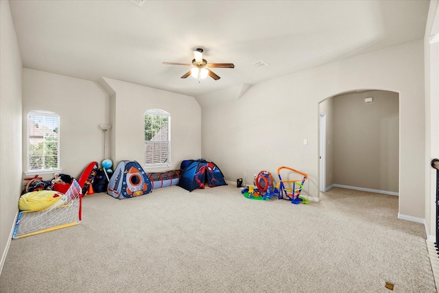 211 Crestbrook Dr, Rockwall, TX 75087 - rec room featuring ceiling fan, carpet, arched walkways, and baseboards