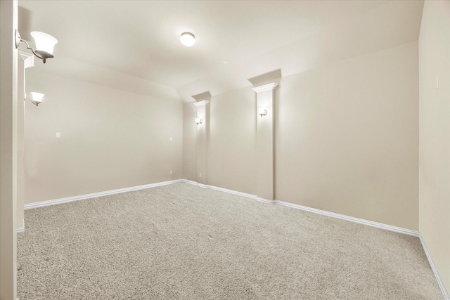 211 Crestbrook Dr, Rockwall, TX 75087 - empty room featuring carpet, vaulted ceiling, and baseboards