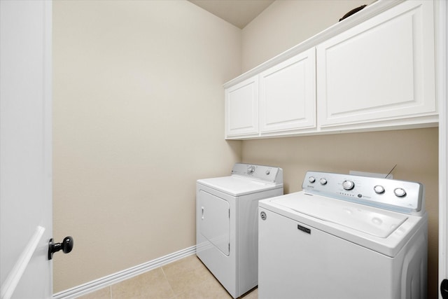 211 Crestbrook Dr, Rockwall, TX 75087 - washroom featuring washer and clothes dryer, cabinet space, baseboards, and light tile patterned flooring
