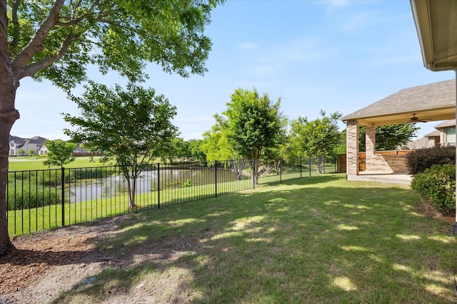 211 Crestbrook Dr, Rockwall, TX 75087 - view of yard featuring a water view and ceiling fan
