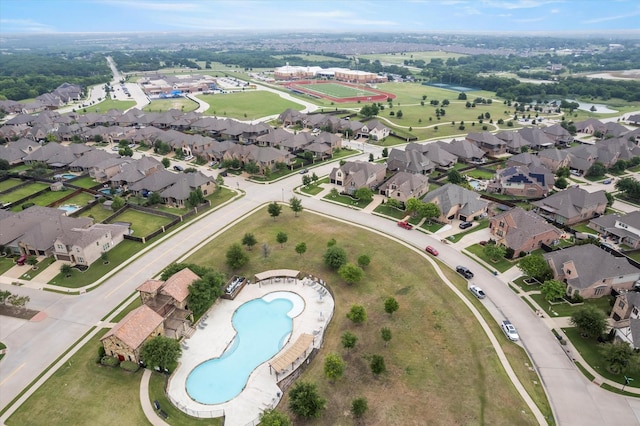 211 Crestbrook Dr, Rockwall, TX 75087 - aerial overview of property's location with a pool and nearby suburban area