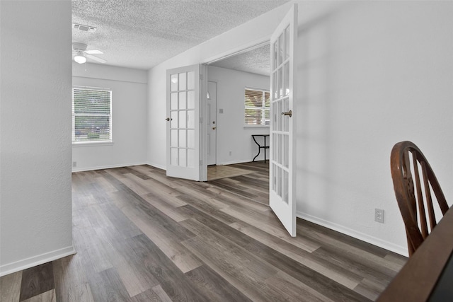 412 Lee Blvd, Pottsboro, TX 75076 - foyer entrance featuring french doors, a textured ceiling, wood finished floors, ceiling fan, and baseboards
