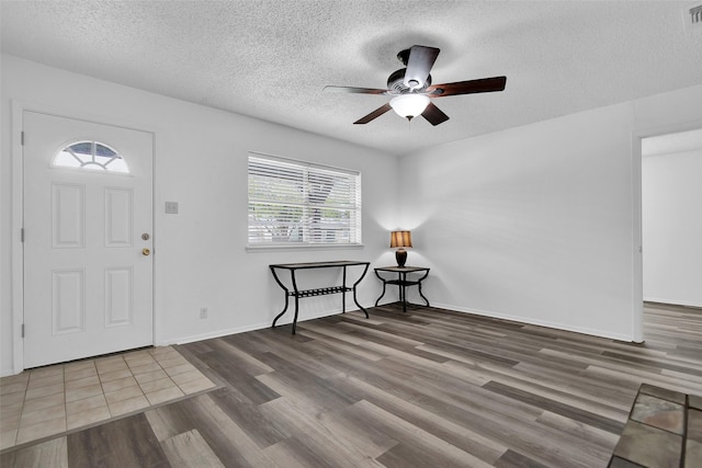 412 Lee Blvd, Pottsboro, TX 75076 - entryway featuring ceiling fan, wood finished floors, a textured ceiling, and baseboards