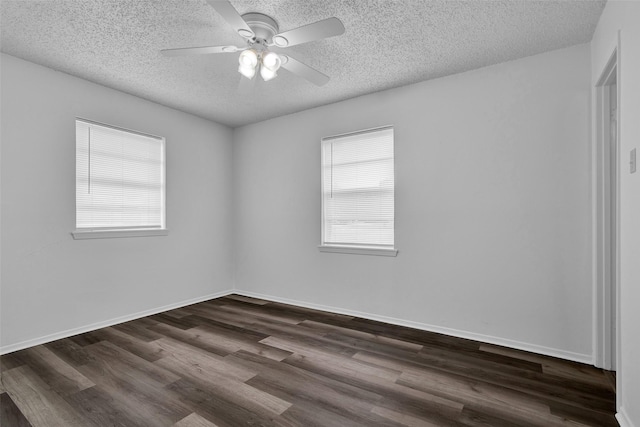 412 Lee Blvd, Pottsboro, TX 75076 - unfurnished room featuring healthy amount of natural light, a textured ceiling, dark wood finished floors, and ceiling fan
