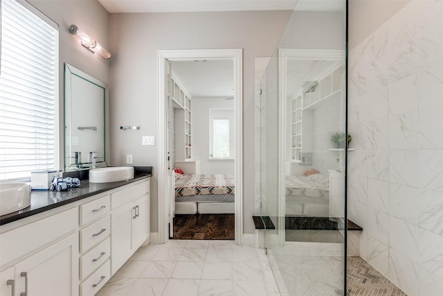 8416 Shoreacres Dr, Mckinney, TX 75070 - full bathroom featuring ensuite bathroom, marble look tiles, a walk in shower, and double vanity