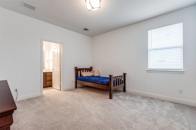 8416 Shoreacres Dr, Mckinney, TX 75070 - bedroom featuring light colored carpet, baseboards, and connected bathroom