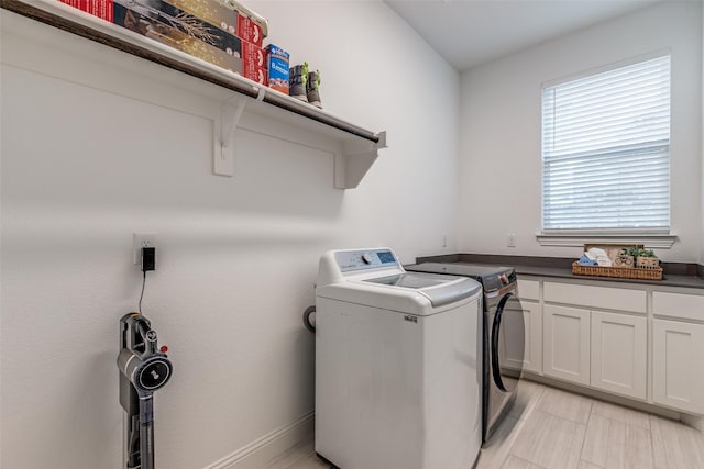 8416 Shoreacres Dr, Mckinney, TX 75070 - laundry area with independent washer and dryer and cabinet space