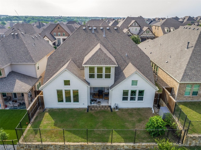 8416 Shoreacres Dr, Mckinney, TX 75070 - rear view of house with a shingled roof, a residential view, a fenced backyard, and a patio area