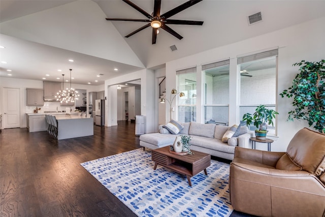 8416 Shoreacres Dr, Mckinney, TX 75070 - living area with ceiling fan, dark wood-type flooring, recessed lighting, a chandelier, and high vaulted ceiling