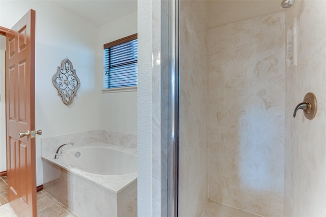 4402 Running Brook Dr, Rowlett, TX 75088 - bathroom featuring a stall shower, tile patterned floors, a garden tub, and baseboards