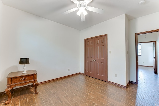 4402 Running Brook Dr, Rowlett, TX 75088 - unfurnished room featuring light wood-type flooring, baseboards, and ceiling fan