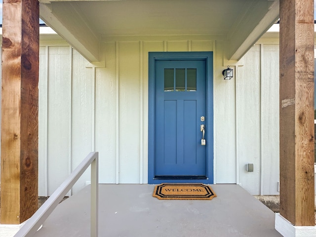 1209 N Morris St, Gainesville, TX 76240 - property entrance featuring board and batten siding