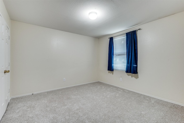 12748 Gillon Dr, Frisco, TX 75035 - carpeted spare room featuring baseboards