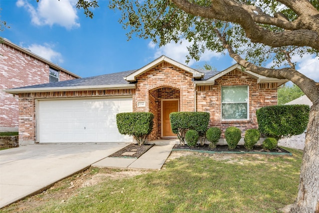 12748 Gillon Dr, Frisco, TX 75035 - view of front facade featuring brick siding, an attached garage, concrete driveway, a front yard, and a shingled roof