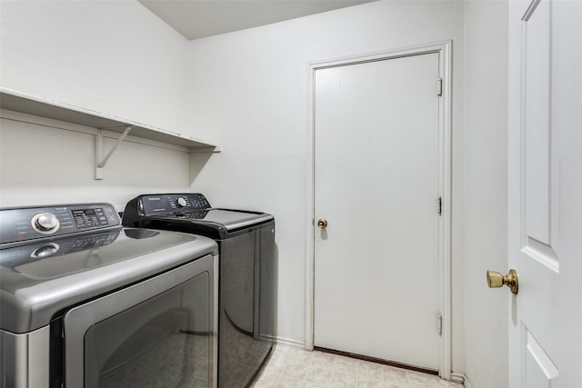 12748 Gillon Dr, Frisco, TX 75035 - washroom with washer and clothes dryer and baseboards
