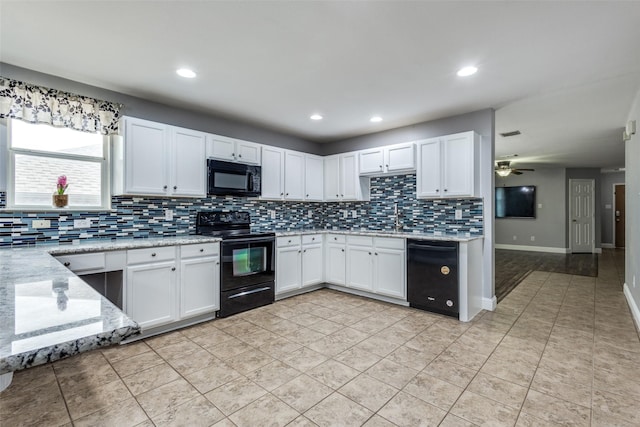 12748 Gillon Dr, Frisco, TX 75035 - kitchen featuring black appliances, decorative backsplash, white cabinets, ceiling fan, and a sink