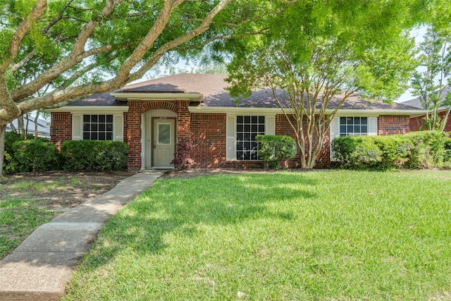 2009 Briargate Ln, Mesquite, TX 75181 - ranch-style home featuring a front lawn, brick siding, and roof with shingles