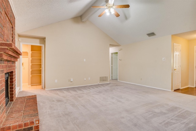 2009 Briargate Ln, Mesquite, TX 75181 - unfurnished living room featuring a ceiling fan, a fireplace, carpet flooring, and baseboards