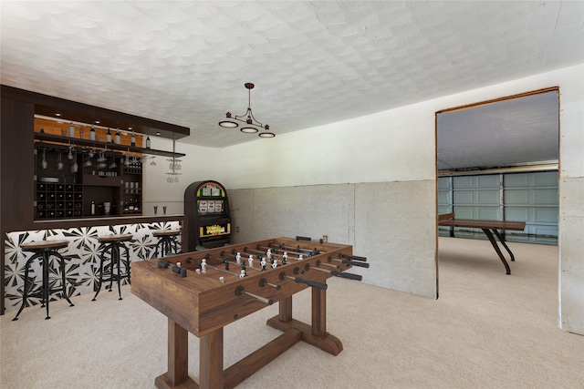 1104 Cortez St, Denison, TX 75020 - recreation room featuring carpet floors and a textured ceiling