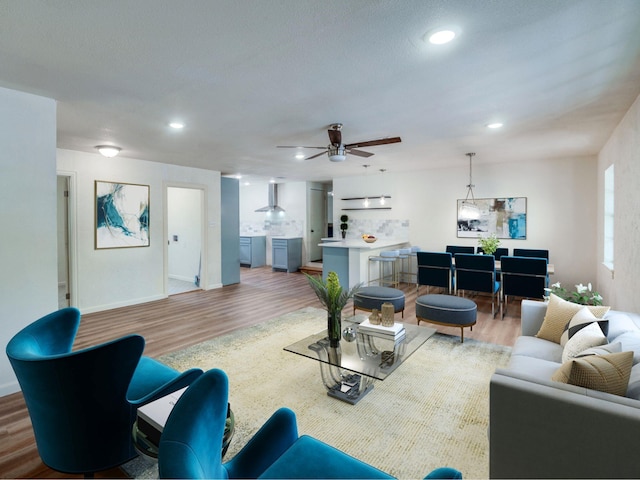 1104 Cortez St, Denison, TX 75020 - living area featuring wood finished floors, recessed lighting, baseboards, and a ceiling fan