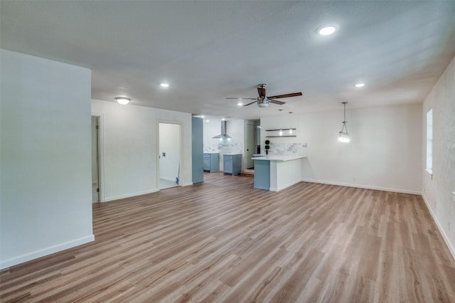 1104 Cortez St, Denison, TX 75020 - unfurnished living room featuring recessed lighting, light wood finished floors, a ceiling fan, and baseboards